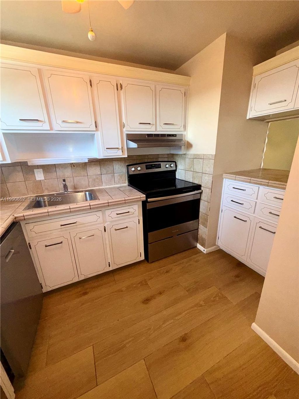 Photo of 4100 Crystal Lake Dr #407, Deerfield Beach, FL 33064 (MLS # A11990652)