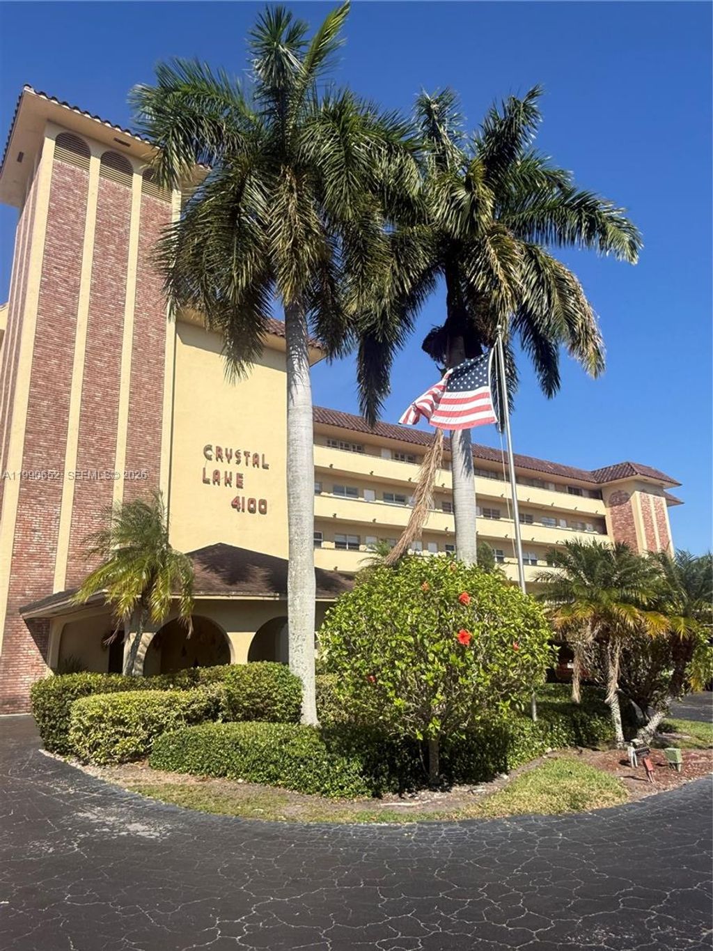 Photo of 4100 Crystal Lake Dr #407, Deerfield Beach, FL 33064 (MLS # A11990652)