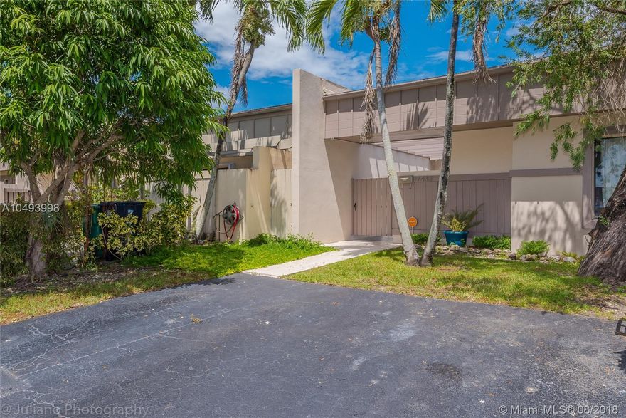 COME SEE THIS UNIQUE 2B/2B VILLA AT CREEKSIDE. THIS UNIT FEATURES NEWER TILE THROUGHOUT, A REDESIGNED KITCHEN WITH SS APPLIANCES, AN ISLAND AND WINE COOLER. BOTH BATHROOMS HAVE BEEN UPDATED BEAUTIFULLY. THE SPACIOUS FAMILY AND DINING ROOMS PROVIDE ROOM FOR MANY GUESTS. THERE IS ALSO A DEN THAT LEADS TO THE FENCED BACK YARD. OTHER FEATURES ARE, A TANK LESS WATER HEATER, HURRICANE SHUTTERS, PRIVATE TWO CAR DRIVEWAY WITH PLENTY OF GUEST PARKING, VERY LOW MONTHLY MAINTENANCE FEE AND MUCH MORE.