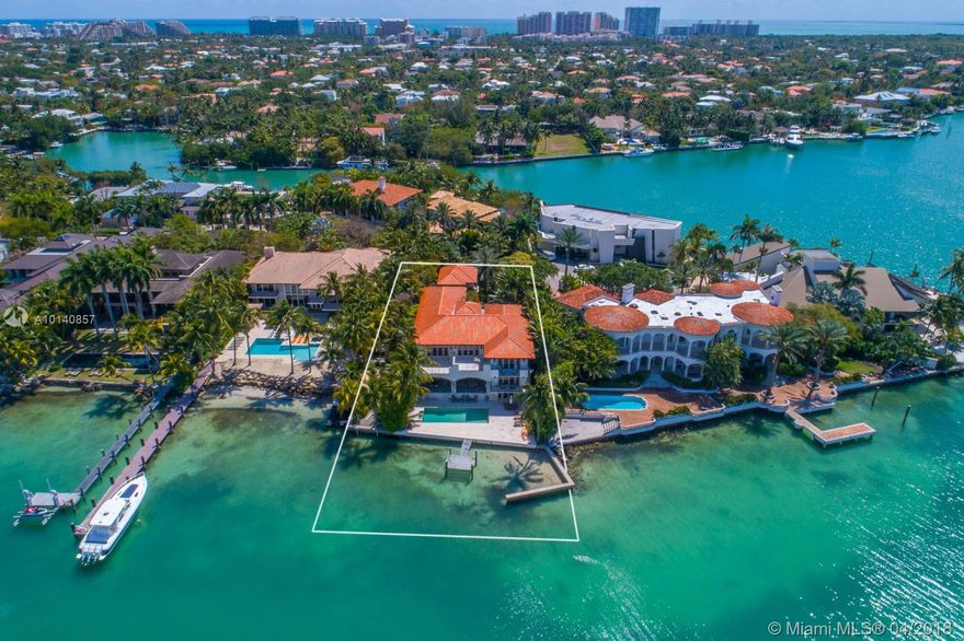 Absolutely stunning, magnificent and one of a kind 2 story estate which offers breathtaking panoramic views of Biscayne Bay. Designed to enjoy every room in the house with exquisite architecture, comfort, elegance and charm. Approx 7,500 sq ft of A/C, 19,085 sq ft of land .. 7 bedrooms, 8.5 baths, office, family room, formal living and dining room areas, gourmet kitchen, 3 car garage, gorgeous terraces, small man created beach and wonderful dock.Located on exclusive Harbor Point this is a dream come true.