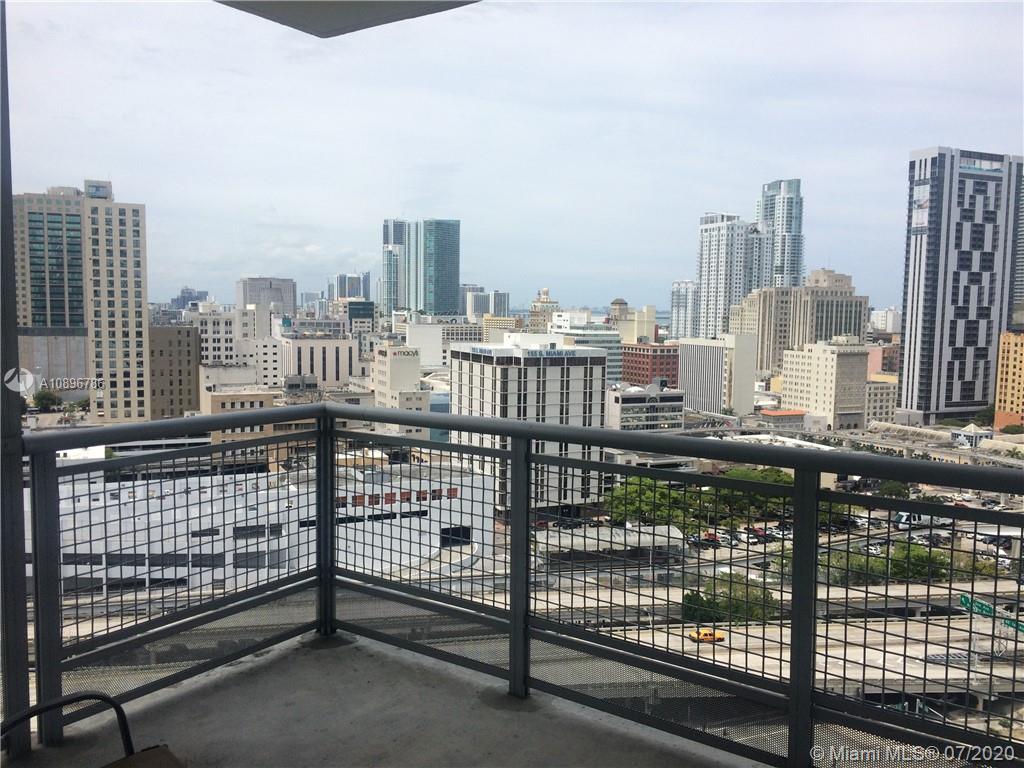 Available immediately: Perfect turn-key furnished 1 bedroom, 1 bathroom w/fantastic skyline view, large terrace & covered parking in luxurious full-service Wind condo. Move right in: open kitchen w/granite countertops & stainless steel appliances, marble bath, walk-in closet, washer/dryer in unit, beautiful furnishings & finishes, fiber optic HD cable TV & internet included. In sought-after building w/pool, spa, gym, party & media rooms, racquetball court & more in perfect location- downtown, Brickell, shops & restaurants! Available for 6 months or longer.
