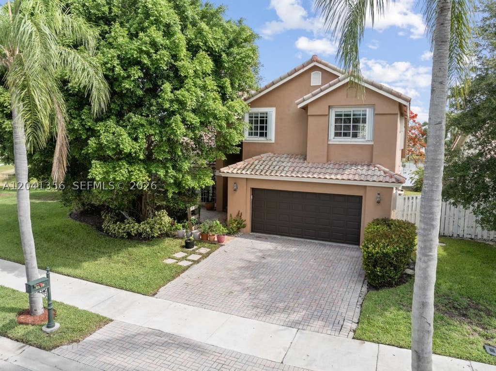 Photo of 1179 Laguna Springs Dr, Weston, FL 33326 (MLS # A12041356)