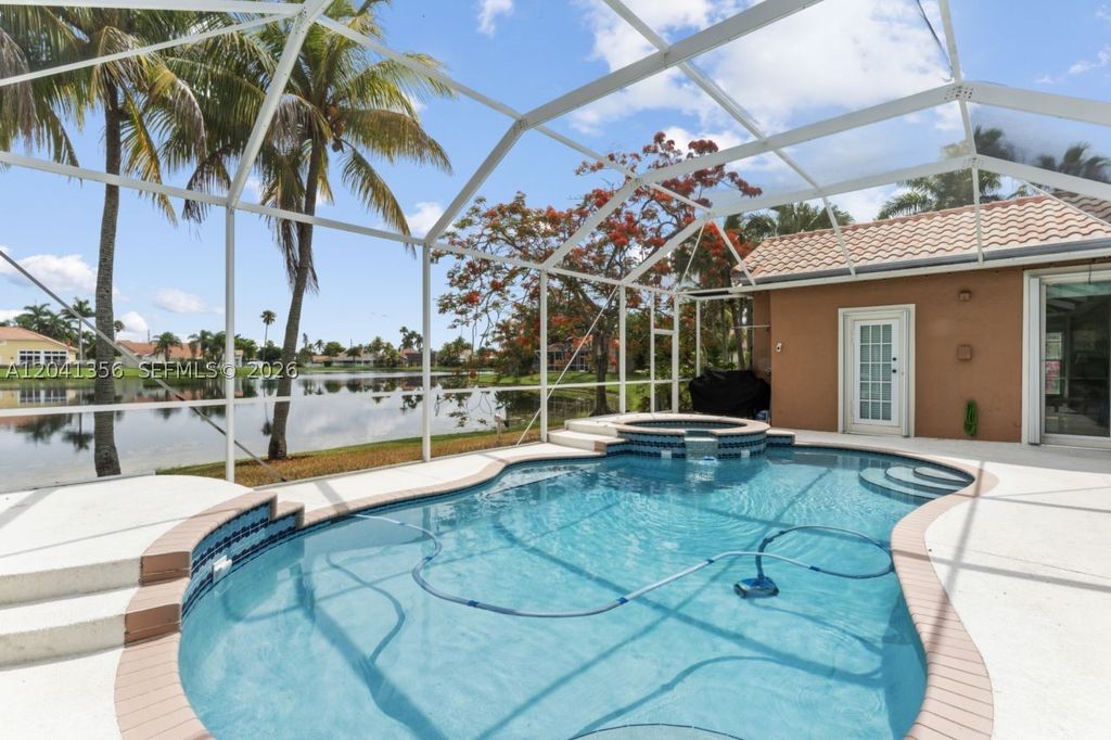 Photo of 1179 Laguna Springs Dr, Weston, FL 33326 (MLS # A12041356)