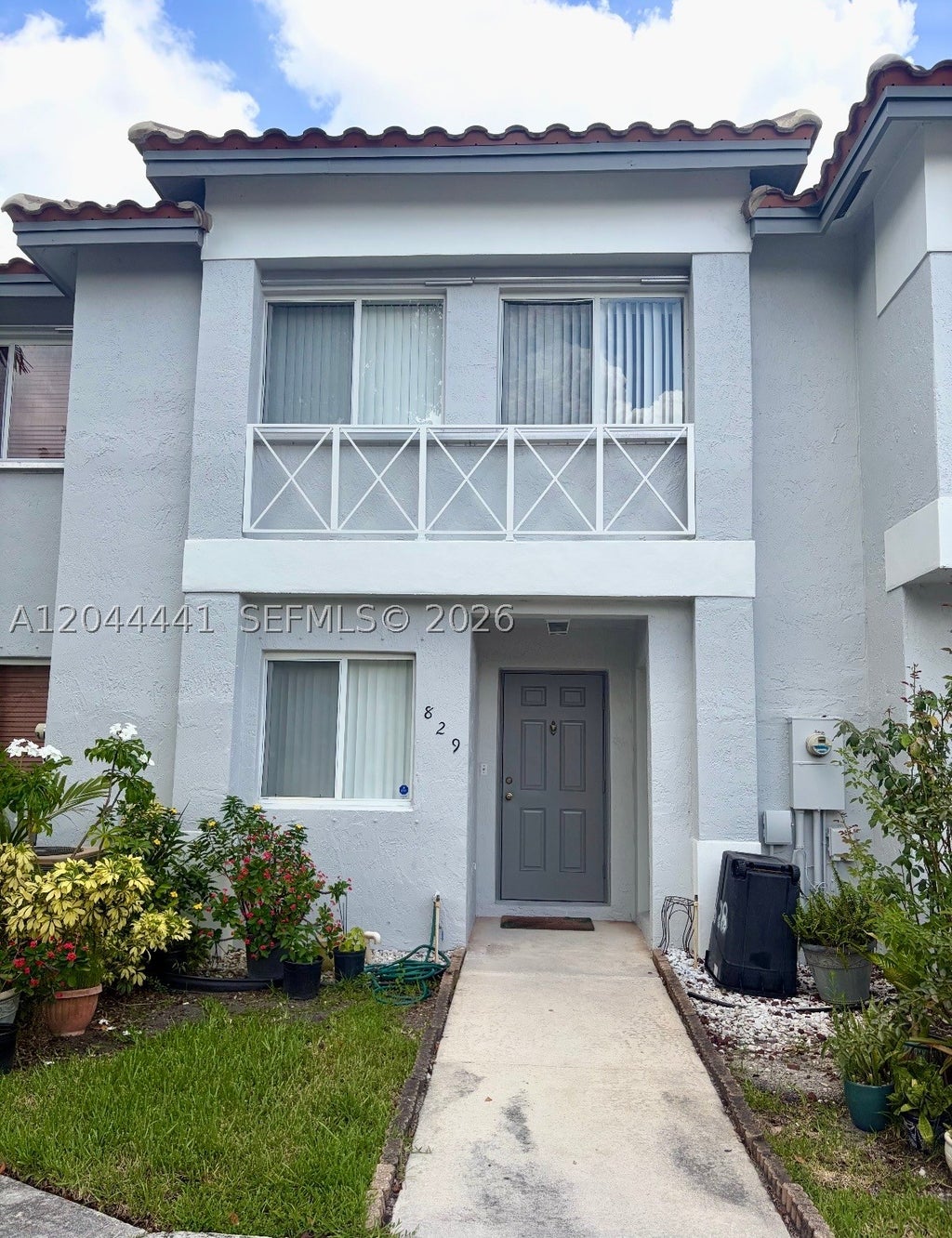 Photo of 829 NW 208th Way, Pembroke Pines, FL 33029 (MLS # A12044441)