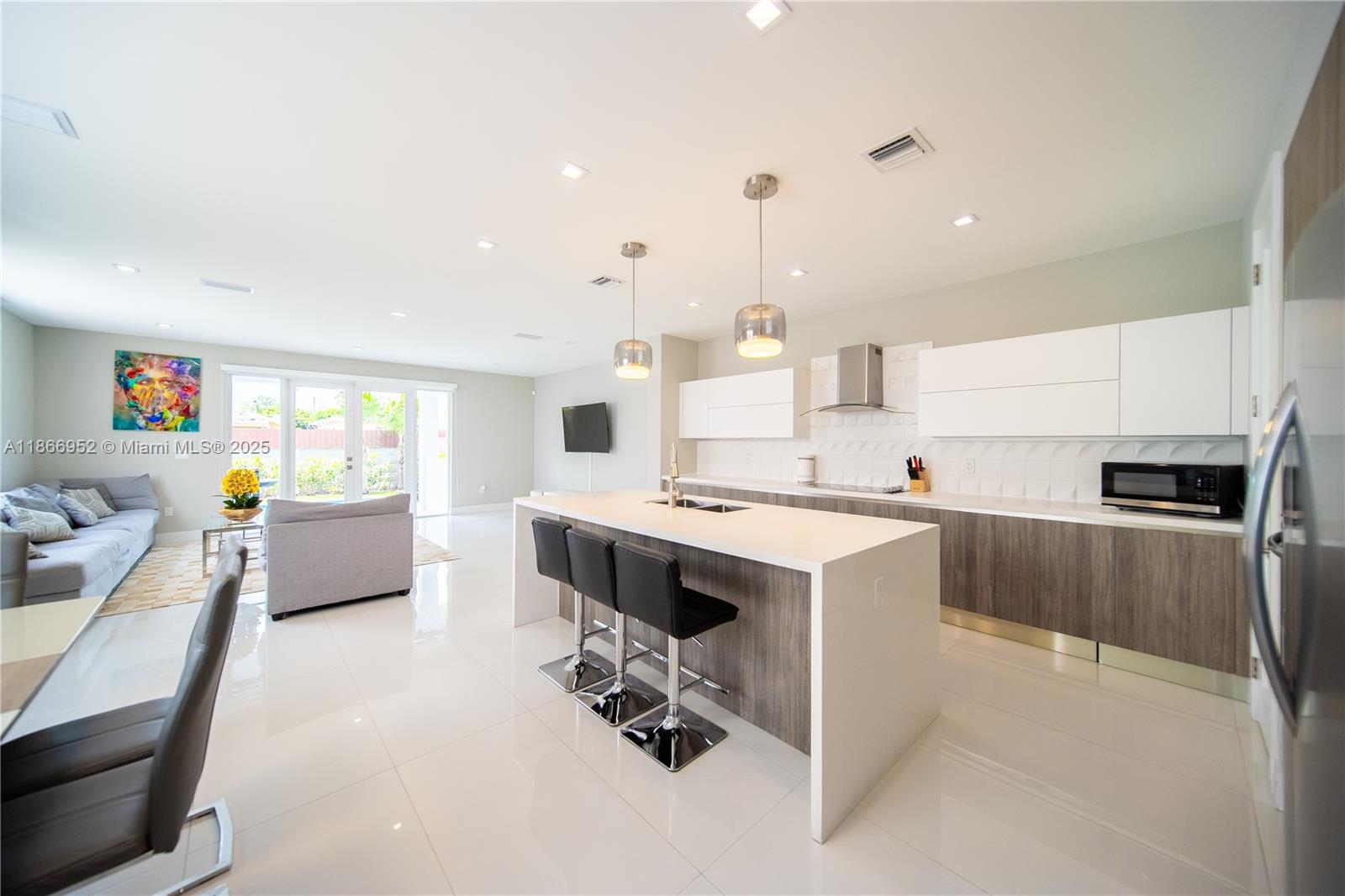 This impeccably furnished 4-bedroom, 3.5-bathroom townhome spanning over 2,900 SQFT. exemplifies modern construction and an abundance of natural light, creating an inviting and sophisticated living space. With the added amenities of a private pool and a convenient garage, it offers both comfort and practicality. Nestled in a prime location near an array of restaurants, the Miami airport, and shops, it provides unparalleled accessibility to essential amenities and leisure activities. This property is a harmonious fusion of luxury and convenience, presenting an exceptional opportunity for those seeking a refined living experience in the heart of Miami.