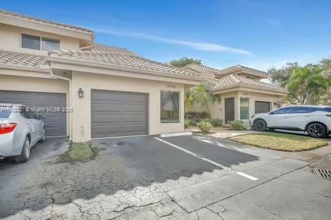 Photo of 16312 Malibu Dr, Weston, FL 33326 (MLS # A11852837) Photo of 16312 Malibu Dr, Weston, FL 33326 (MLS # A11852837)