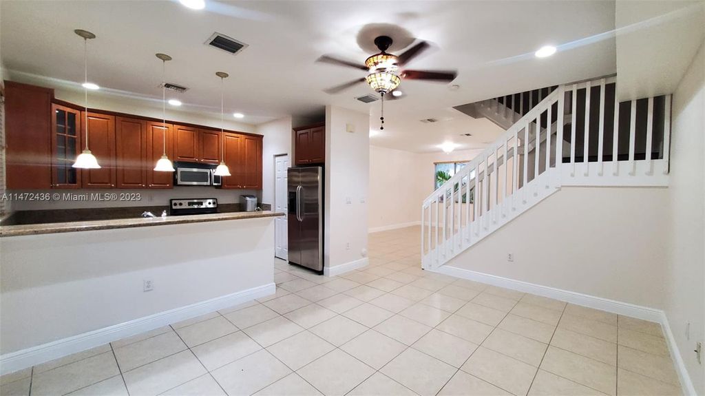 Photo of 6584 Hidden Cove Dr #5-5, Davie, FL 33314 (MLS # A11472436)