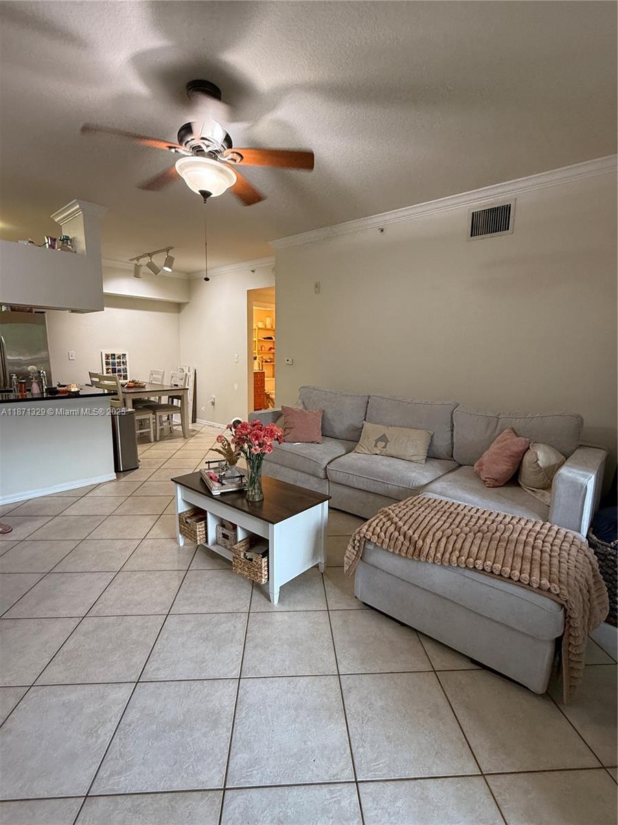 Prime Location! This beautiful 1-bedroom condo is perfectly situated on the second floor with a relaxing pool view. The unit features granite countertops, stainless steel appliances and tile flooring throughout the living areas. The bedroom offers laminate flooring and a spacious walk-in closet. Convenience is key with an in-unit washer & dryer, a private balcony with an extra storage closet, and a 1 car Garage is included aside from regular parking. The community provides resort-style amenities, and your monthly rent covers basic cable and water. Ideally located with easy access to the Turnpike, shopping, dining, and more, this home is a must-see!
