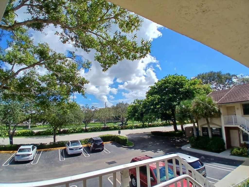 Photo of 2834 Coral Springs Dr #2834, Coral Springs, FL 33065 (MLS # A11908246)