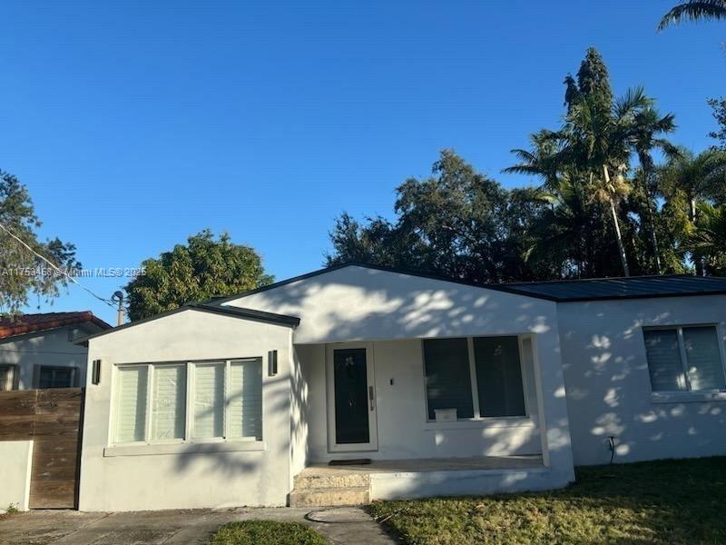 Fully renovated 4/3 plus den/home office in desirable neighborhood across from The Roads. Easy access to I95, Coral Way and US1. New appliances, freshly painted inside and out, new roof, plumbing + electricity , large eat-in kitchen facing family room. New porcelain tile floor throughout the house, new bathrooms. Upgrating porch + drive way.