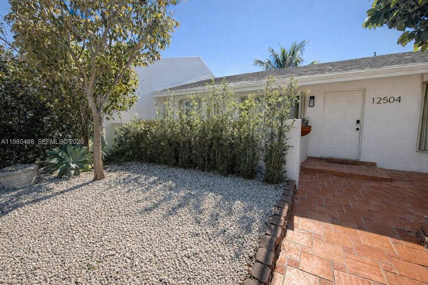 Beautifully renovated 3 bedroom, 2 bathroom home located in a quiet and desirable Kendall neighborhood. This move in ready property features modern upgrades throughout, creating a clean and comfortable living space perfect for families or anyone looking for a turnkey home. The home includes a bright open layout, updated kitchen and bathrooms, and spacious bedrooms. One of the highlights of the property is the private backyard, designed for both relaxation and entertaining. The front yard has been completely redone with artificial turf and landscaping, creating a unique Key West style entrance that gives the home great curb appeal. Conveniently located near top rated schools, parks, shopping, and major highways, this home offers both comfort and accessibility.