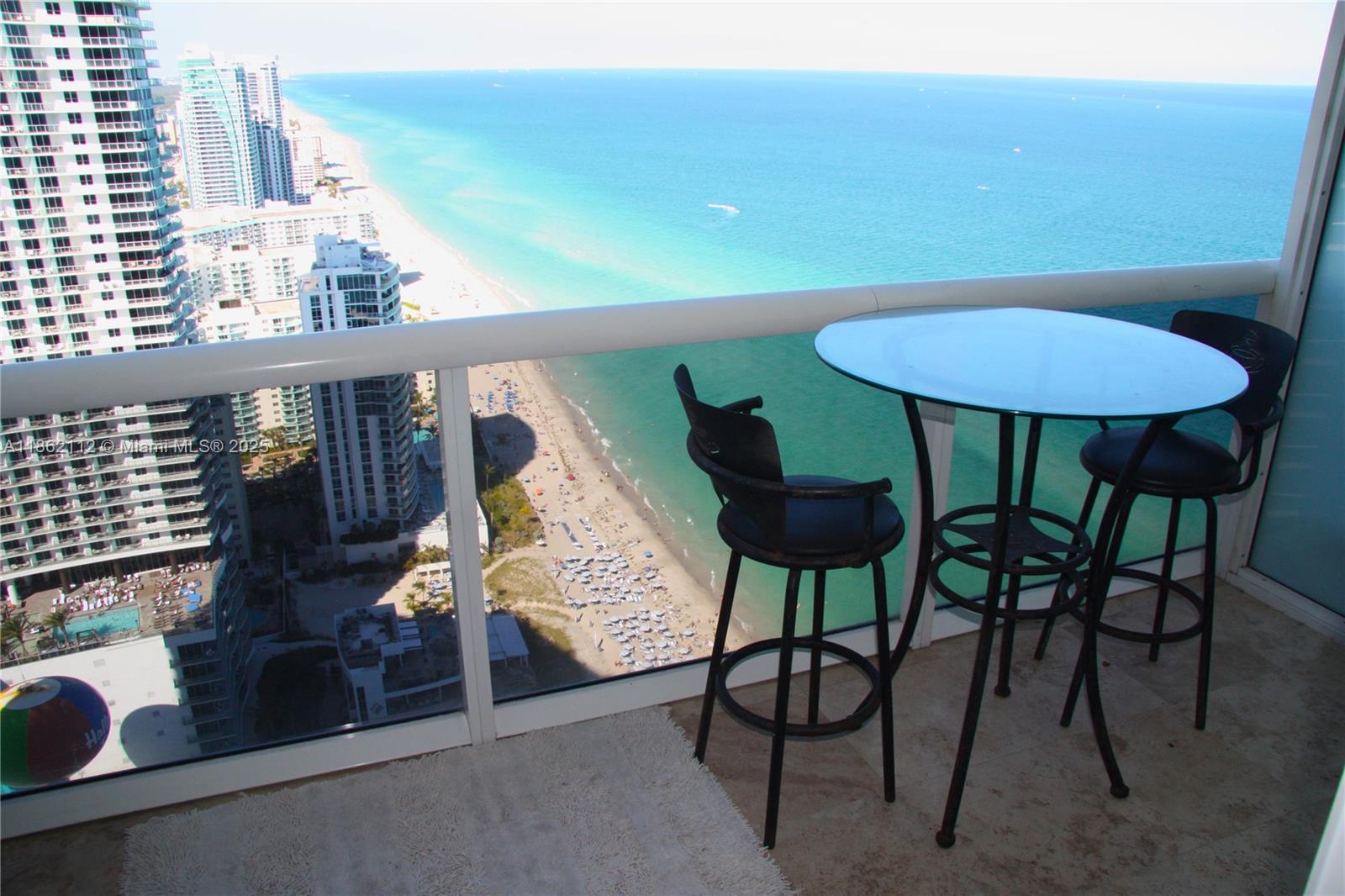 SEE FOR YOURSELF! THE BEST AVAILABLE UNIT ON THE MARKET FOR RENT. THE VIEW WILL BLOW YOU AWAY. YOU WILL FEEL LIKE YOU ARE ON TOP OF THE WORLD. THIS UNIT IS TASTELY FURNISHED JUST BRING YOUR TOOTHBRUSH & ENJOY. Located on the ocean on 9 acres of property. The beach club offers 5 star hotel style amenities. It is a paradise with multiple pools, a state of the art fitness center overlooking the water, one assigned parking spot and one complimentary valet and much more.