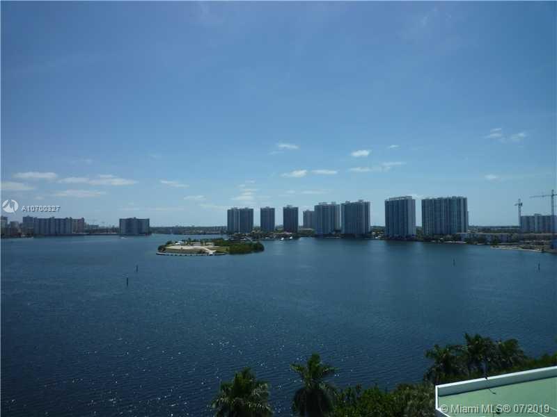 DIRECT WATER VIEWS IN THIS MAGNIFICENT REMODELED 3 /3 MARBLE AND WOOD FLOORS, STAINLESS STEEL APPLIANCES, CROWN MOLDINGS, NEW CABINETS, LUXURY BUILDING, WALK TO RESTAURANTS, MALL, CLOSE TO THE BEACH, CLOSETS GALORE