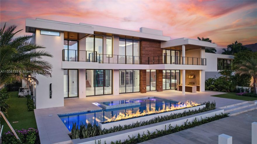 Nestled in the prestigious Nurmi Isles neighborhood of Fort Lauderdale lies this stunning new construction waterfront estate offering the epitome of modern luxury and sophistication. The sleek and contemporary design is evident from the moment you step inside, with clean lines, and spacious living spaces. The estate features 6 luxurious bedrooms, each with its own spa-like bathroom. The kitchen is equipped with top-of-the-line appliances and finishes, making it a chef's dream come true. Large windows and doors allow for plenty of natural light and stunning views of the waterfront, while the indoor and outdoor living spaces seamlessly blend together, creating the perfect backdrop for entertaining and relaxation. Elevated solid concrete construction for peace of mind and storm protection.