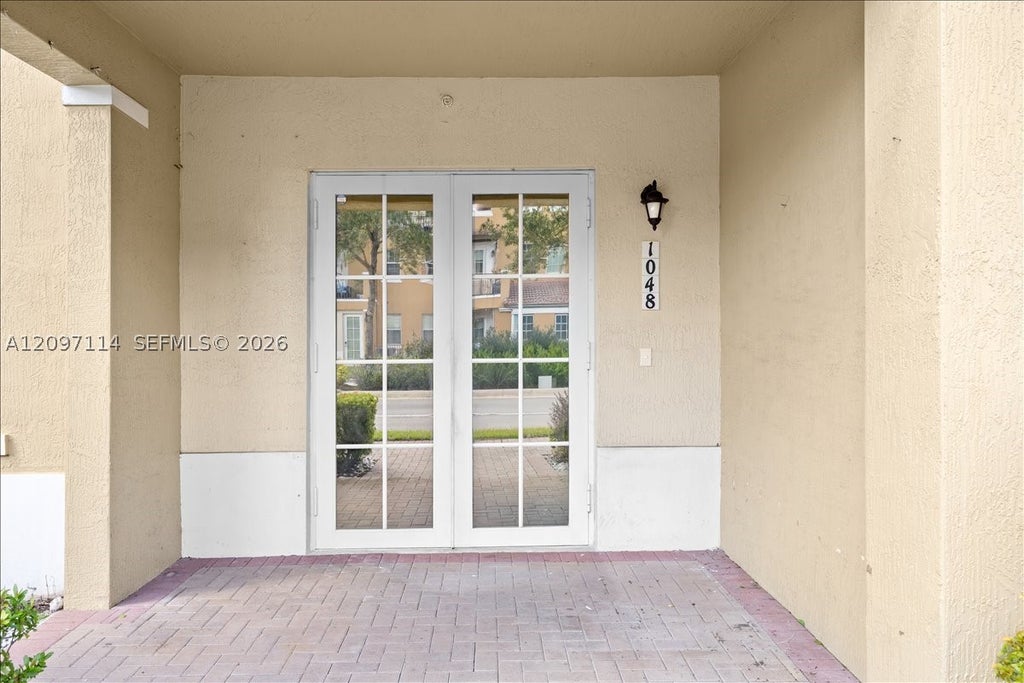 Photo of 1048 SW 147th Ave #10107, Pembroke Pines, FL 33027 (MLS # A12097114)
