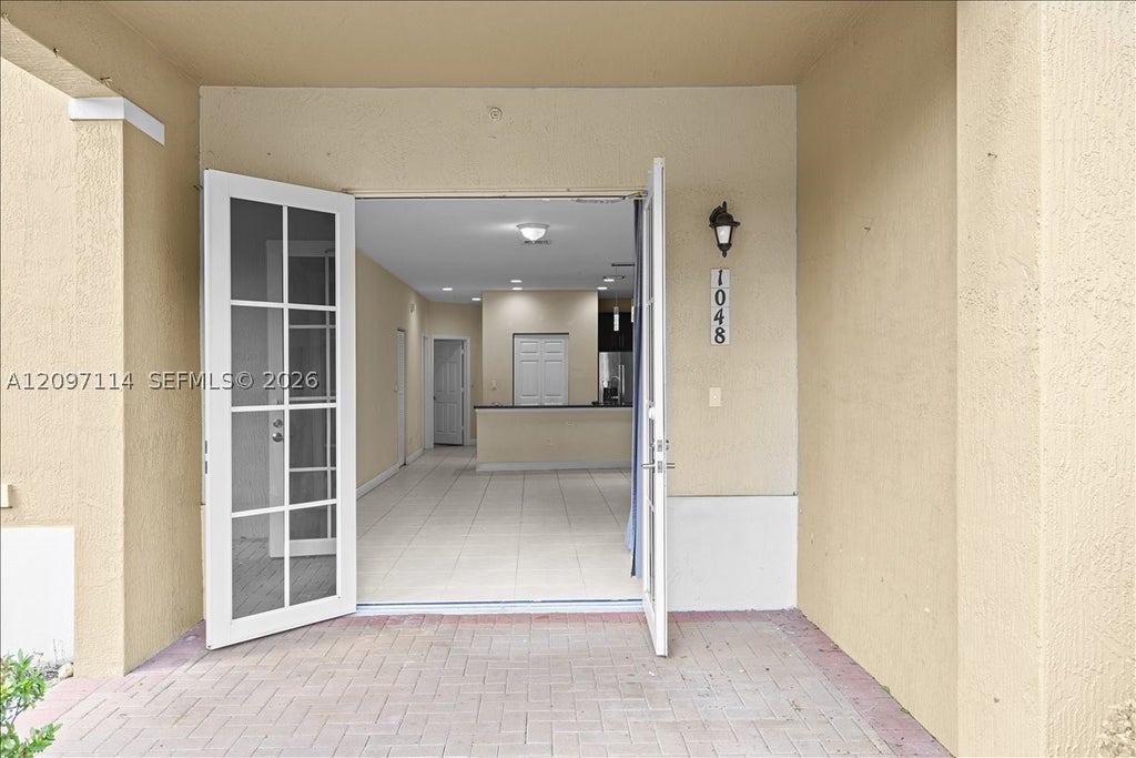 Photo of 1048 SW 147th Ave #10107, Pembroke Pines, FL 33027 (MLS # A12097114)