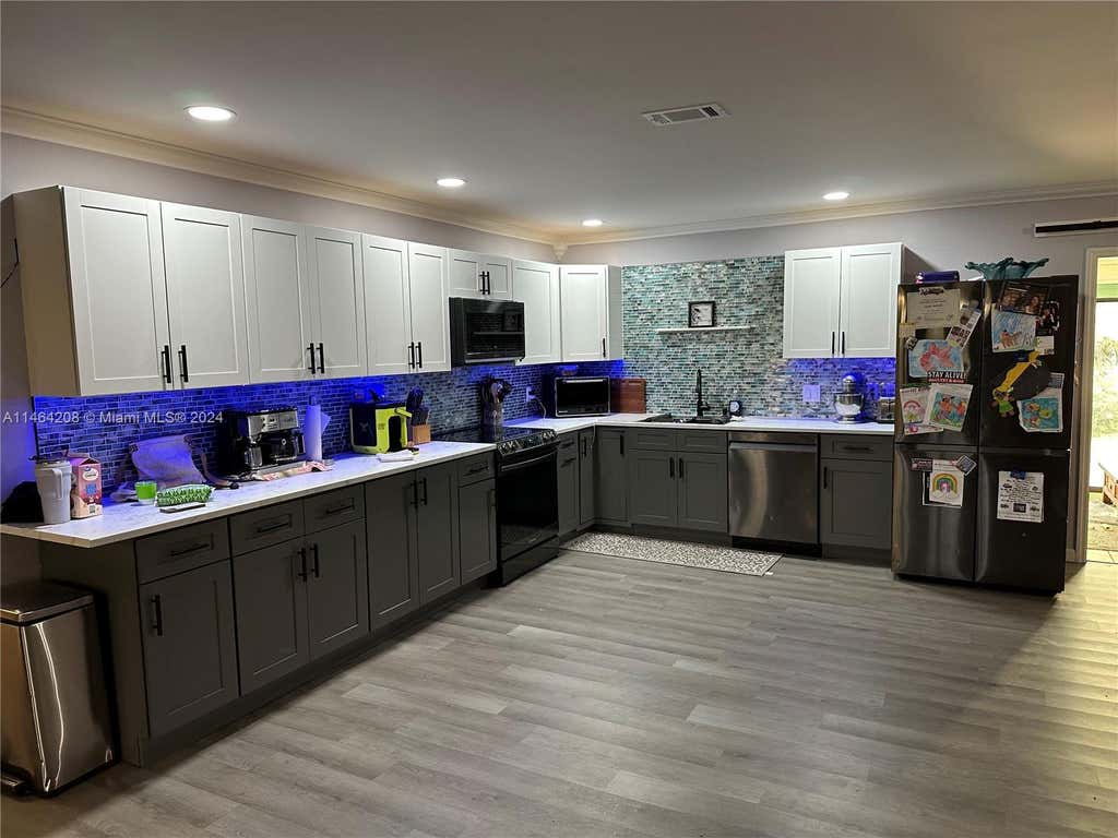 Photo of 1750 SW Castinet Ln, Port Saint Lucie, FL 34953 (MLS # A11464208)