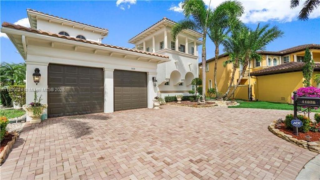 Photo of 11076 NW 79th Pl, Parkland, FL 33076 (MLS # A11820724)