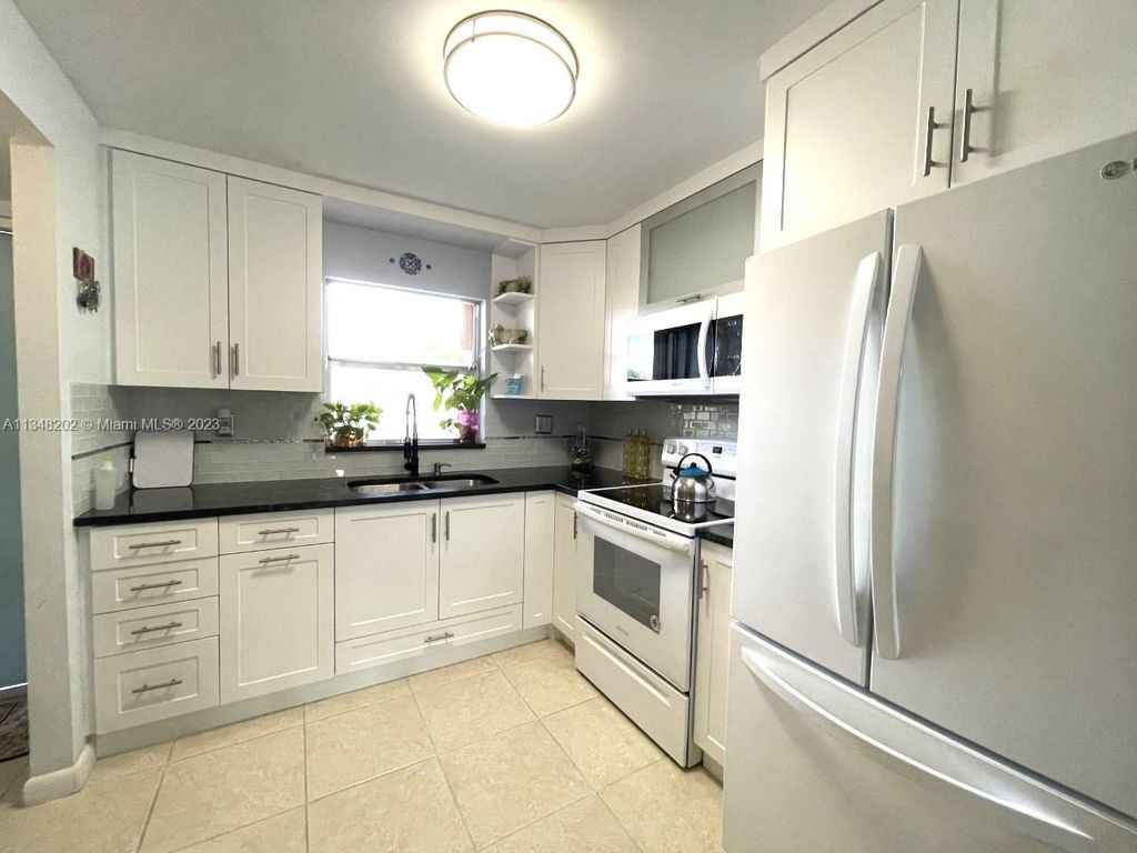 Photo of 9350 Sunrise Lakes Blvd #106, Sunrise, FL 33322 (MLS # A11348202)