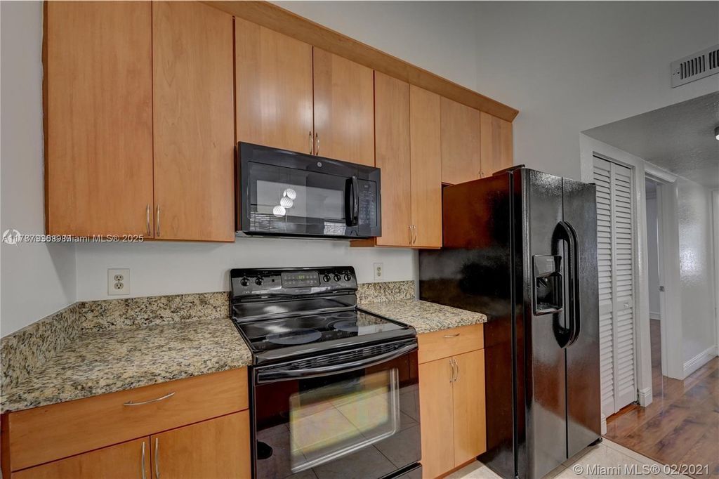 Photo of 2850 N Oakland Forest Dr #202, Oakland Park, FL 33309 (MLS # A11787936)