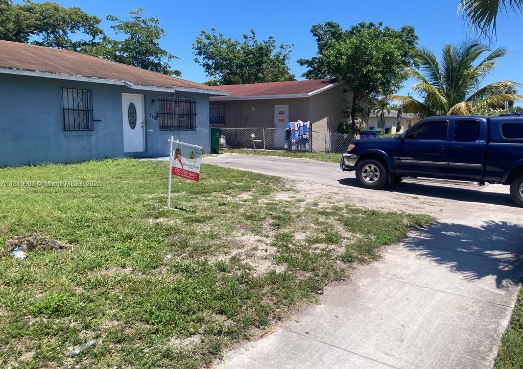 Photo of 1265 NW 27th Ave, Fort Lauderdale, FL 33311 (MLS # A11819907)