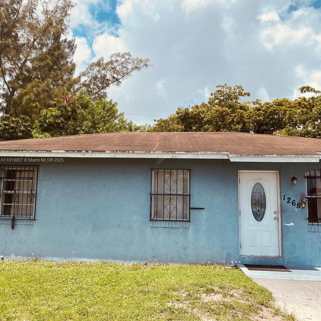 Photo of 1265 NW 27th Ave, Fort Lauderdale, FL 33311 (MLS # A11819907)