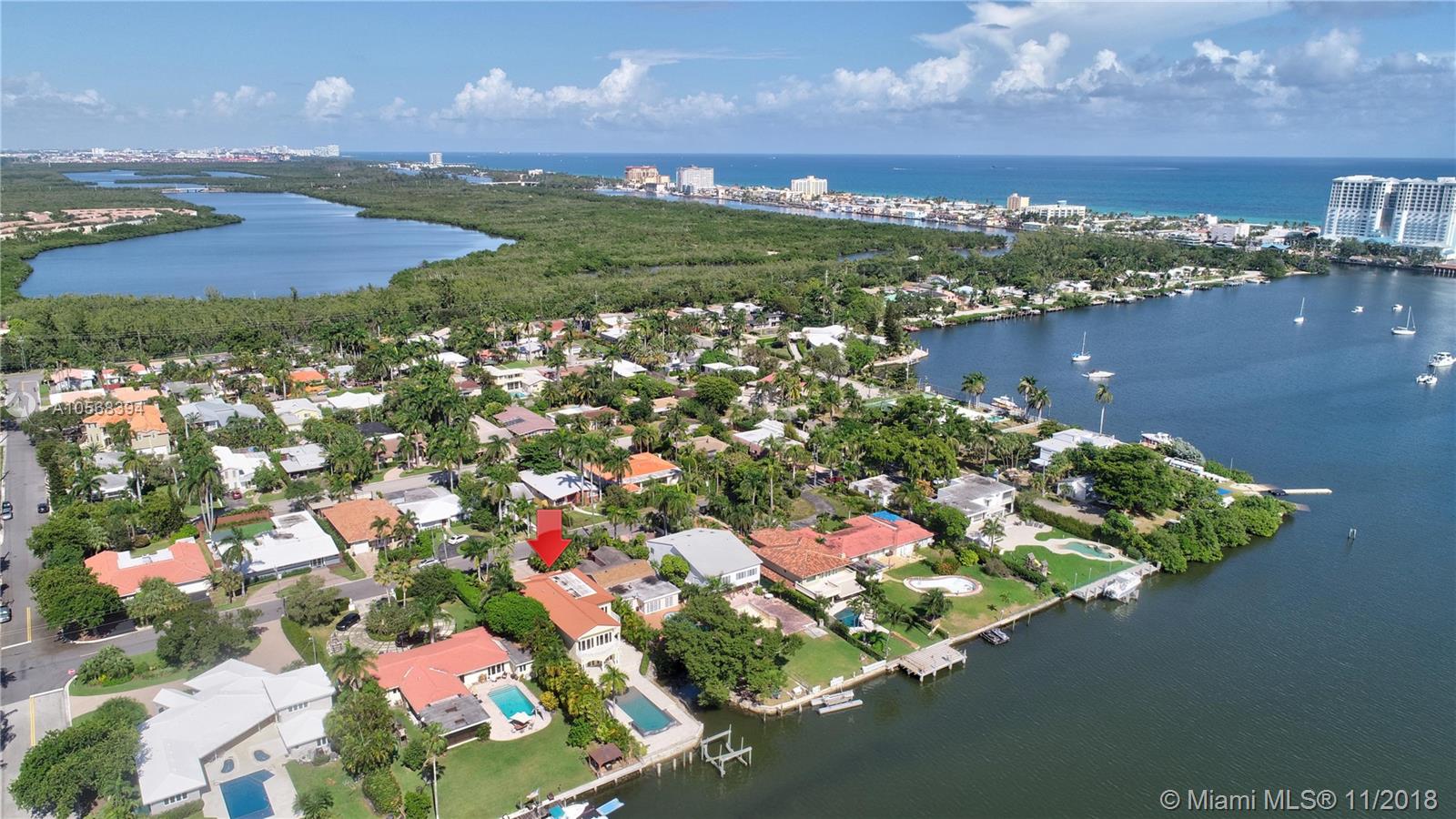 Incredible opportunity to live on the water w/ no fixed bridges and ocean access. Architecturally designed Pebble Tech Pool w/Beach Shelf entry, Spill over Spa w/bubblers & waterfall w/mote.
Spacious bright living area, floor to ceiling glass & new Brazilian wood floors. Open Kitchen w/Gas Thermadore professional cook top, Subzero frig etc. 
Prestigious Hollywood Lakes, centrally located, biking distance to Hollywood Beach.
2 balconies on second level overlooking the pool & gorgeous water views. Large Travertine Patio surrounding pool w/option for a Summer Kitchen-gas connection.Currently 5 bed 4 bath-has various options for different layouts-rooms for Media, Office, Summer Kitchen, Entertainment/Play Room...All Hurricane impact windows/doors. Generator ready.
Must see to appreciate!