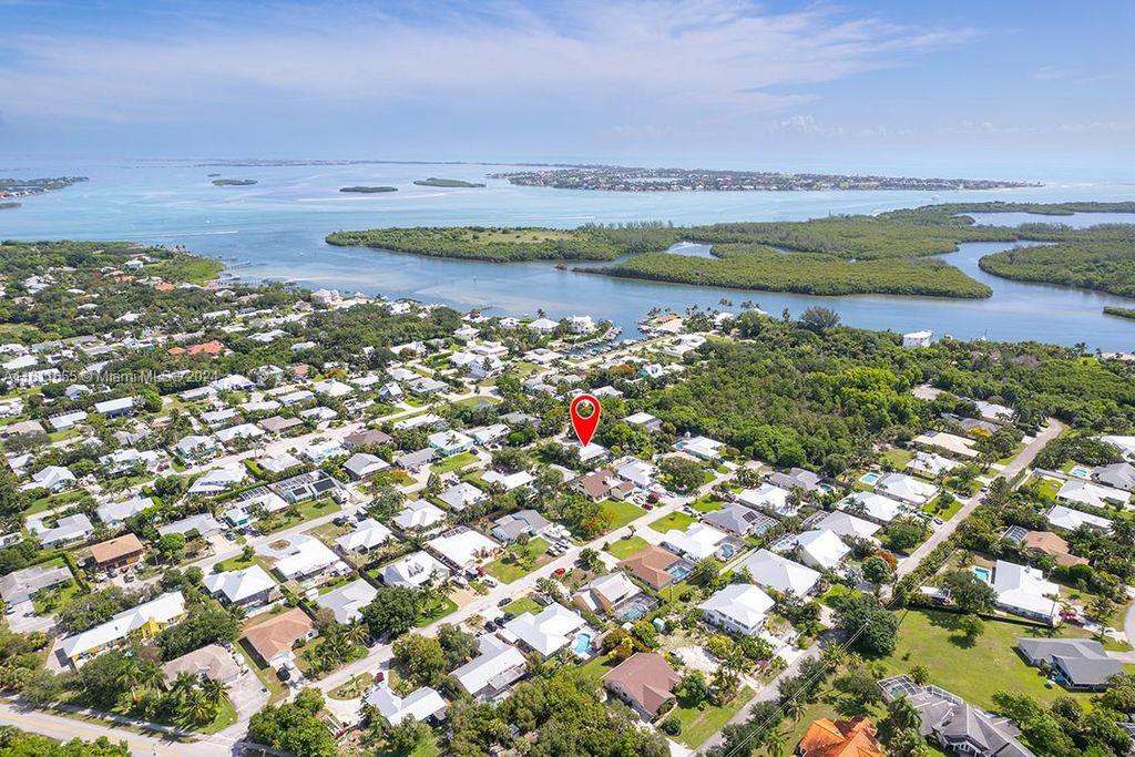 Photo of 5686 SE Matousek St, Stuart, FL 34997 (MLS # A11611655)