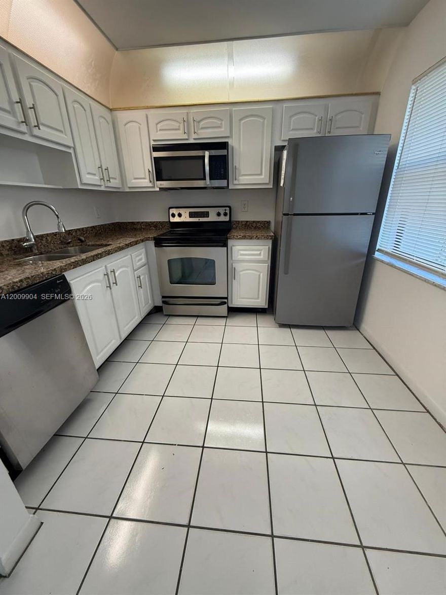 *more pics coming soon* Beautiful 4/2.5 townhouse in prestigious Delray Beach. Master downstairs with full bathroom and three bedroom upstairs. Walk in closets. Upgraded kitchen with granite counters and stainless steal appliances. Newer laminate floors and some title throughout. Large covered screened-in patio, and fenced-in backyard for privacy. Safe gated community with swimming pool, tennis and basketball courts, and playground. Spanish river high school near by. TENANT IN PLACE PAYING $2800 UNTIL JULY 31 2026. PROOF OF FUNDS AND ADVANCED SCHEDULED SHOWING REQUIRED.