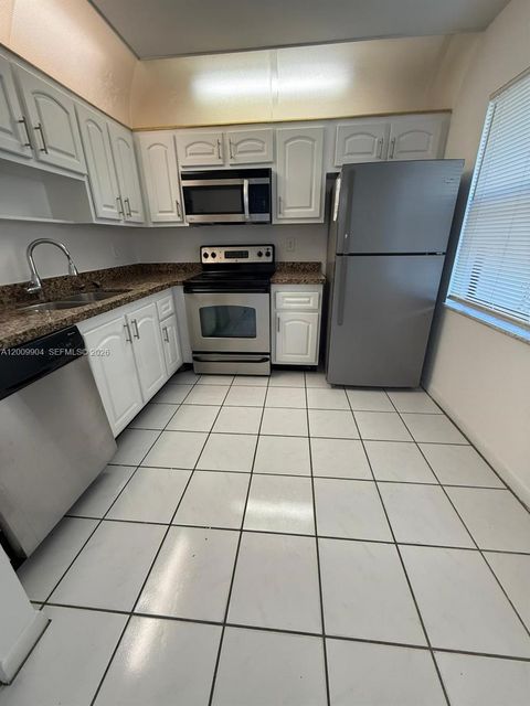 Photo of 16413 Grape Way, Delray Beach, FL 33484 (MLS # A12009904)