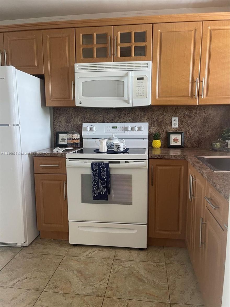 Great 55+ Community with amenities , 18+ years may live with one occupant 55+ . This condo is updated Newer AC and water heater. Impact windows located near sawgrass mills, doctors , hospitals , restaurants, shopping and mayor highways. rentals allow after 2 years of ownership. 700 credit score required and $40,000. yearly income.Tile tru out apt except in guess bedroom bran new water proof laminate flooring.