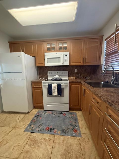 Photo of 8345 Sunrise Lakes Blvd #309, Sunrise, FL 33322 (MLS # A11880665)