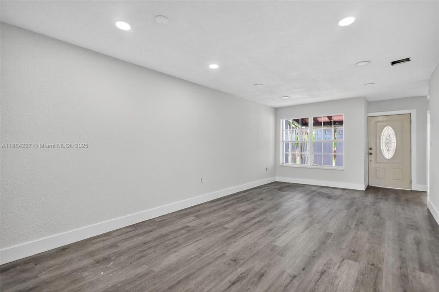 Bright and renovated 3-bedroom 2-bathroom home in Hialeah! Beautiful, full of light, freshly painted, with brand new bathrooms, floors and a remodeled kitchen. Covered back patio and convenient driveway parking. Close to major thoroughfares and shopping.