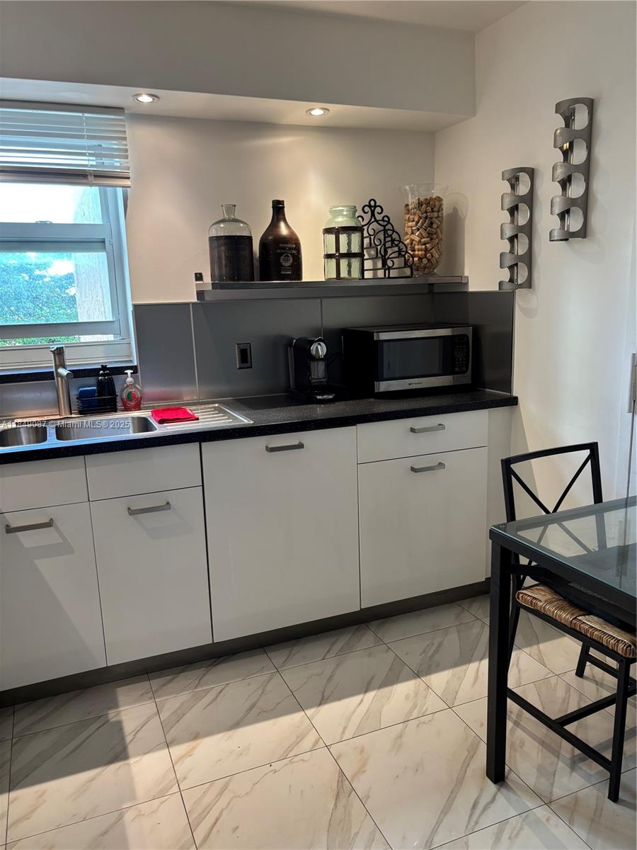 PRINCE GEORGE ARMS CONDO - Residential Lease