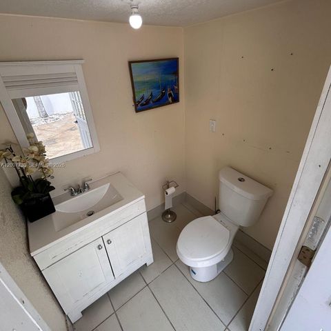 Tiny photo for 221 NE 24th St, Pompano Beach, FL 33064 (MLS # A12007730)