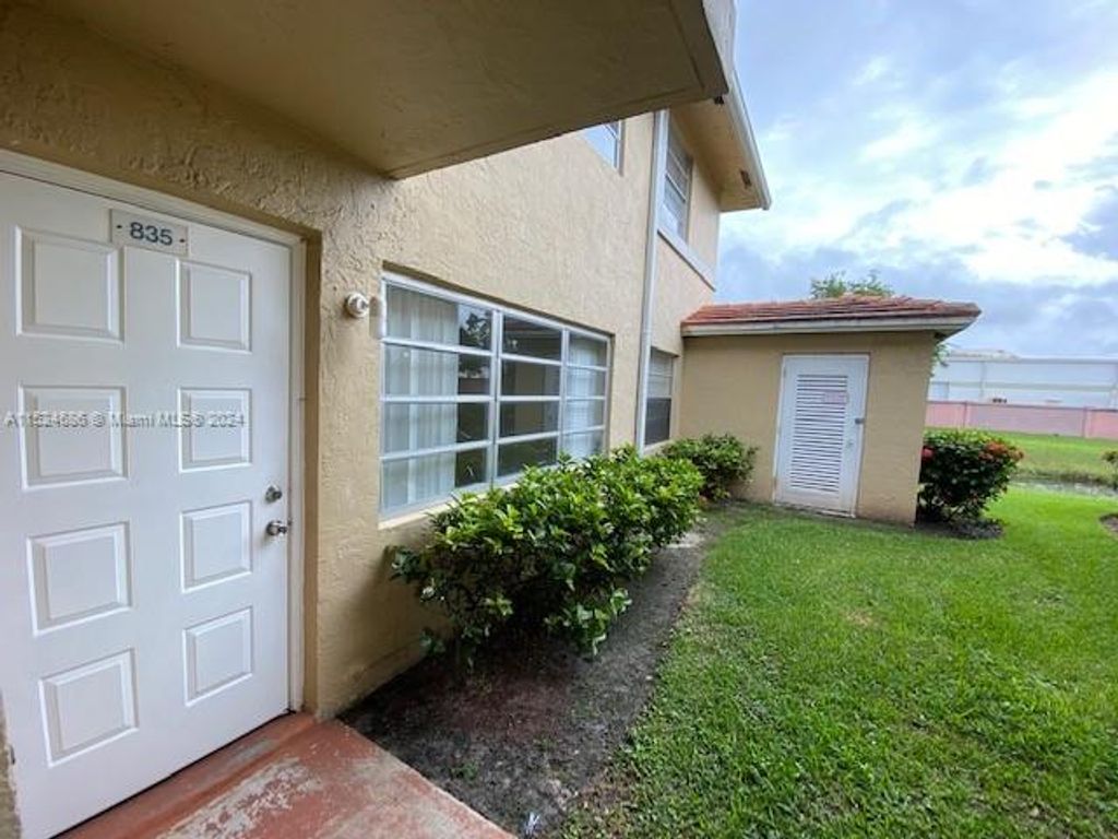 Photo of 835 Twin Lakes Dr #30-C, Coral Springs, FL 33071 (MLS # A11524686)