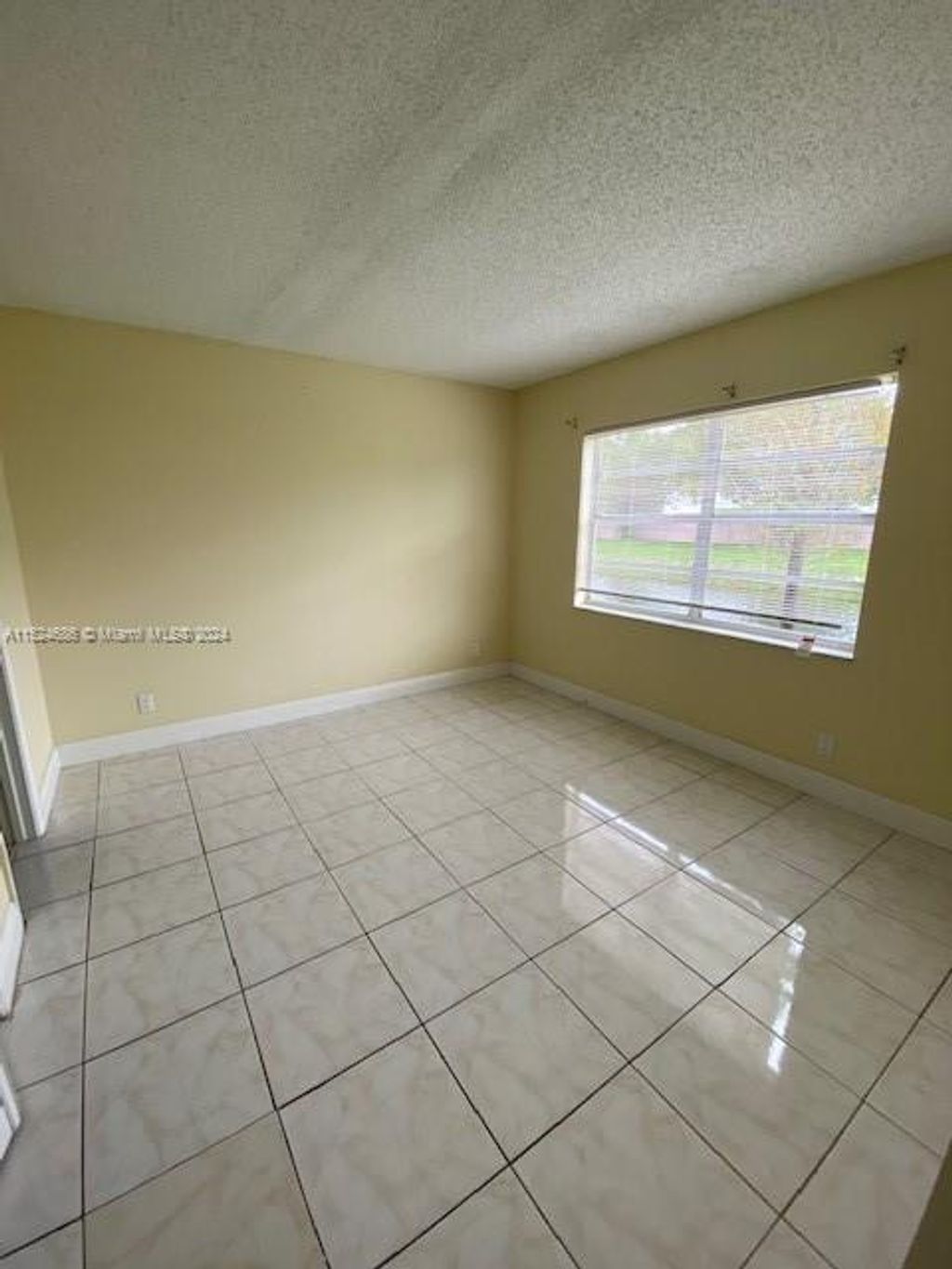 Photo of 835 Twin Lakes Dr #30-C, Coral Springs, FL 33071 (MLS # A11524686)