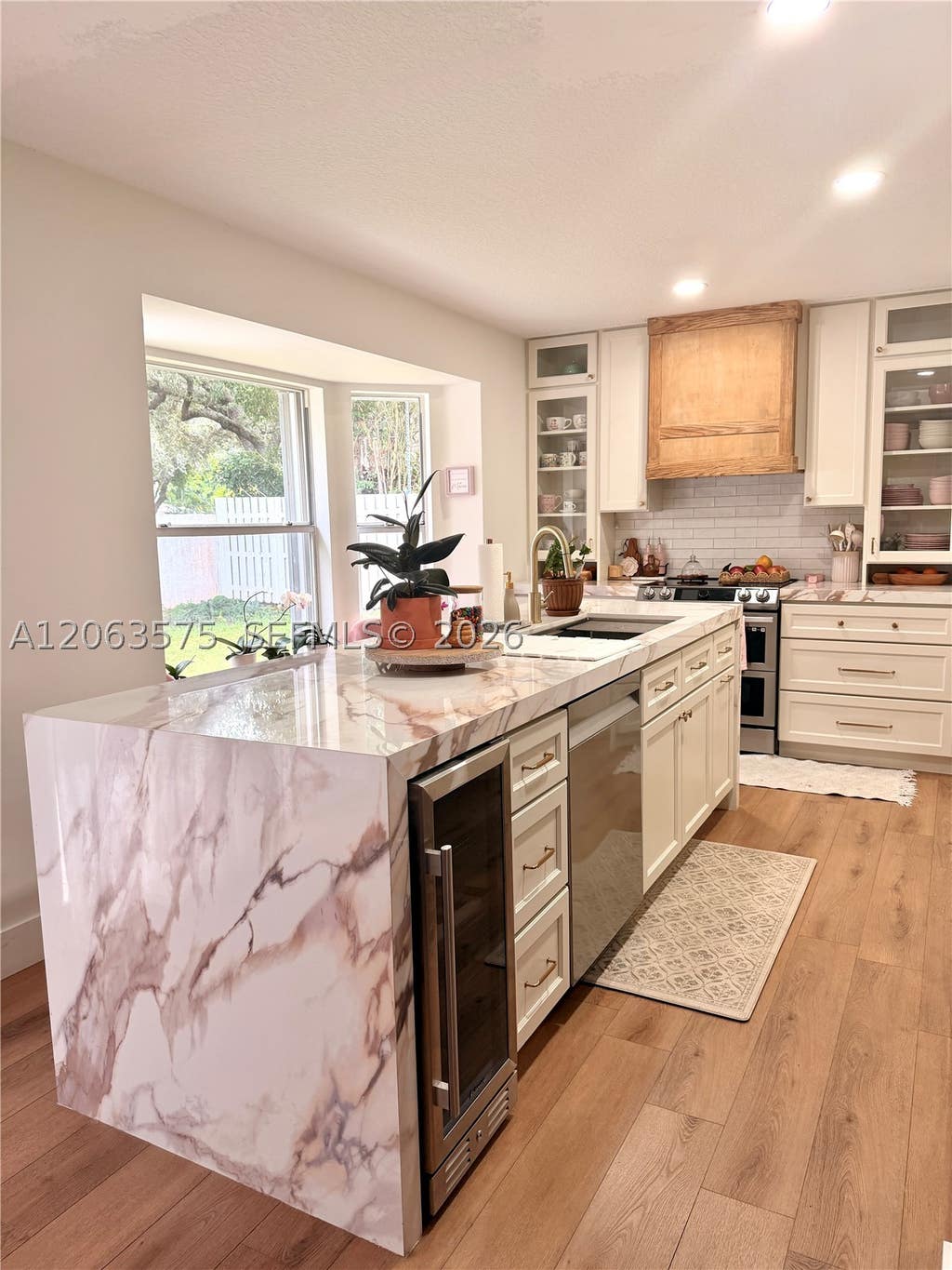 Photo of 12672 NW 11th Ct #1, Sunrise, FL 33323 (MLS # A12063575)