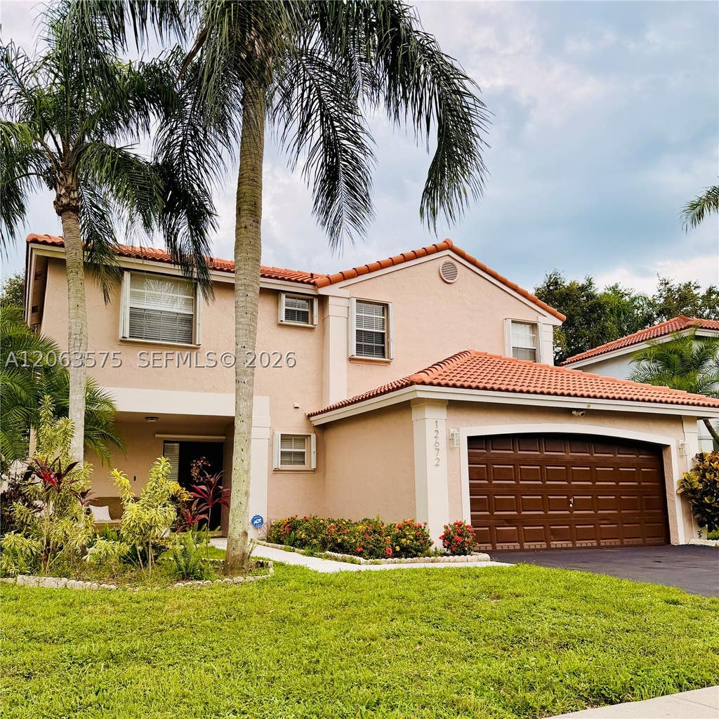 Photo of 12672 NW 11th Ct #1, Sunrise, FL 33323 (MLS # A12063575)