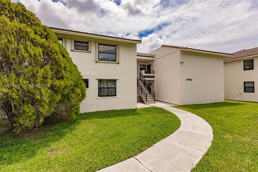 EXCELLENT LOCATION! Updated 3 Bedroom 2 Bathroom unit. Split floor plan. Nice size master bedroom with walk in closet. Open Kitchen with good living and dining space. New Flooring through out living space and bedrooms. The Balcony has been professionally enclosed with impact sliding windows and done permits and association approval giving extra living space and indoor laundry! This unit had been meticulously maintained and is in move in condition! Guard gated Community. Pool, tennis and more! LOW Association fee! Close to FIU, Miami Airport, Dolphin Mall, IKEA and many other shops and restaurants. Special assessment has been paid by the seller!