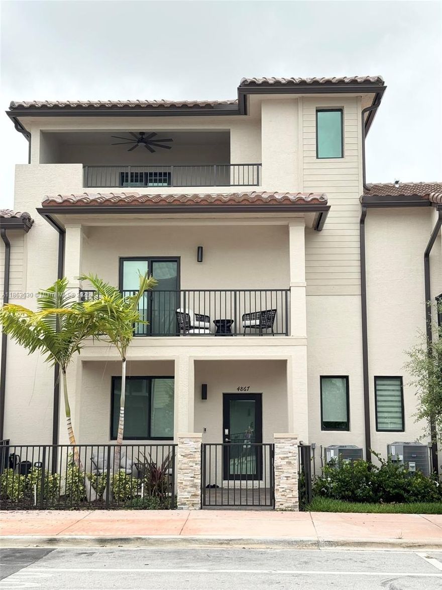 Stunning 3-story townhome in the heart of Downtown Doral! Just 3 minutes from Downtown Doral Plaza and top-rated schools, this brand-new end-unit (built late 2024) offers modern luxury living with extensive upgrades. Features include matte porcelain tile and luxury vinyl flooring throughout, custom built-in TV wall and designer panels, and sleek, contemporary finishes. Spacious, bright, and thoughtfully designed, this home combines style and functionality—perfect for modern living in one of Doral’s most desirable communities.