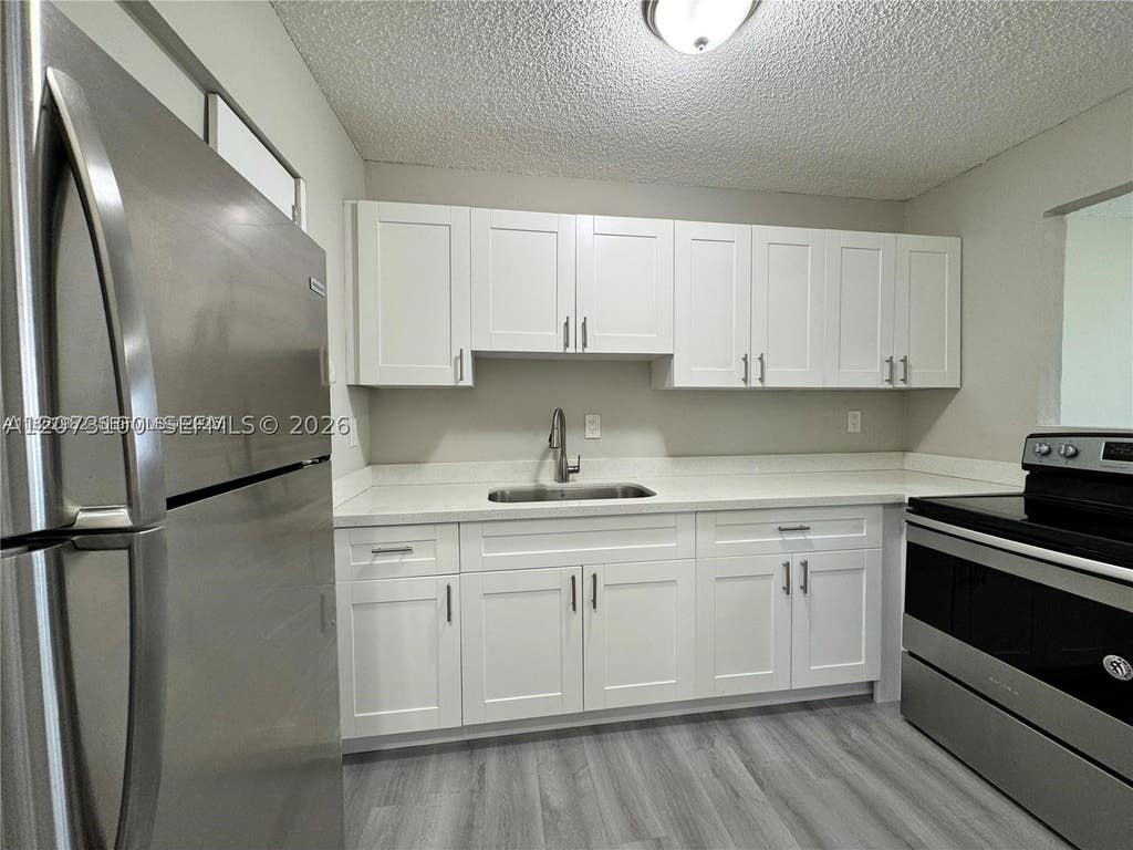 Photo of 2237 Taylor St #3B, Hollywood, FL 33020 (MLS # A12073100)