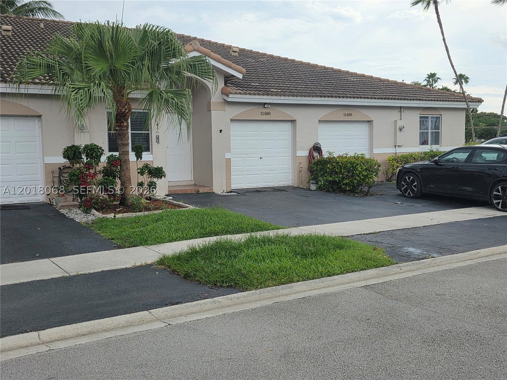 Photo of 11480 SW 18th Ct #11480, Miramar, FL 33025 (MLS # A12018068)