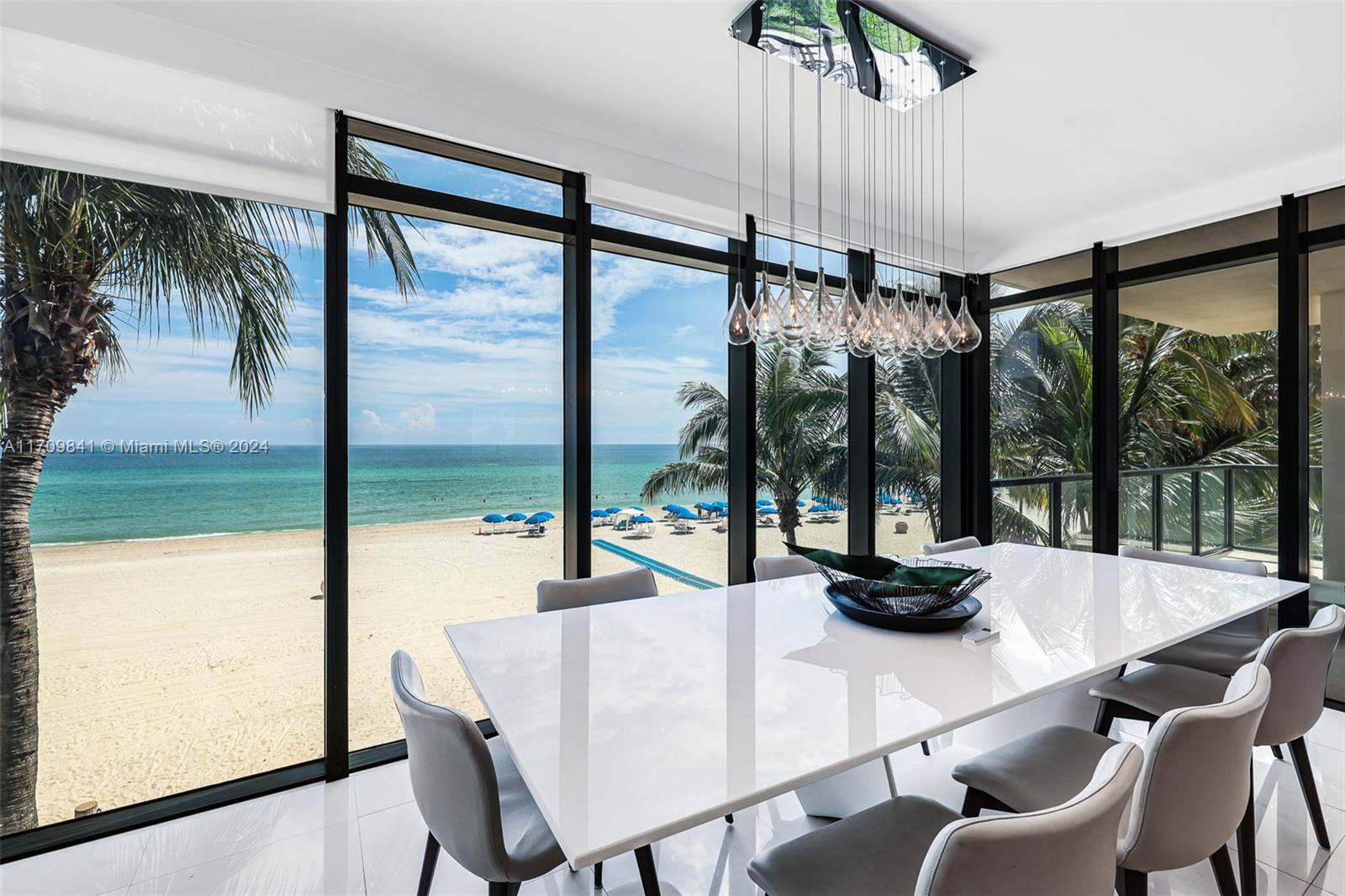 Sophisticated Oceanfront Living. Experience breathtaking ocean views from this five-story boutique residence with direct beach access. Each floor features two units and a private elevator opens directly into the unit’s foyer, welcoming you to 2,606 sq. ft. of luxurious living space, complemented by two spacious balconies with unobstructed ocean views.
This exquisitely designed model unit, furnished by Artefacto, offers three bedrooms, each with an en-suite bathroom, plus a stylish powder room. The gourmet kitchen boasts high-end appliances, including a wine refrigerator and a gas cooktop, perfect for culinary enthusiasts. Generously sized laundry room.
Price includes private cabana and same floor storage. Enjoy the ultimate beachfront lifestyle, with premier dining, entertainment​​‌​​​​‌​‌​​​‌‌​​​‌‌‌​​‌​​‌‌​​​​ options