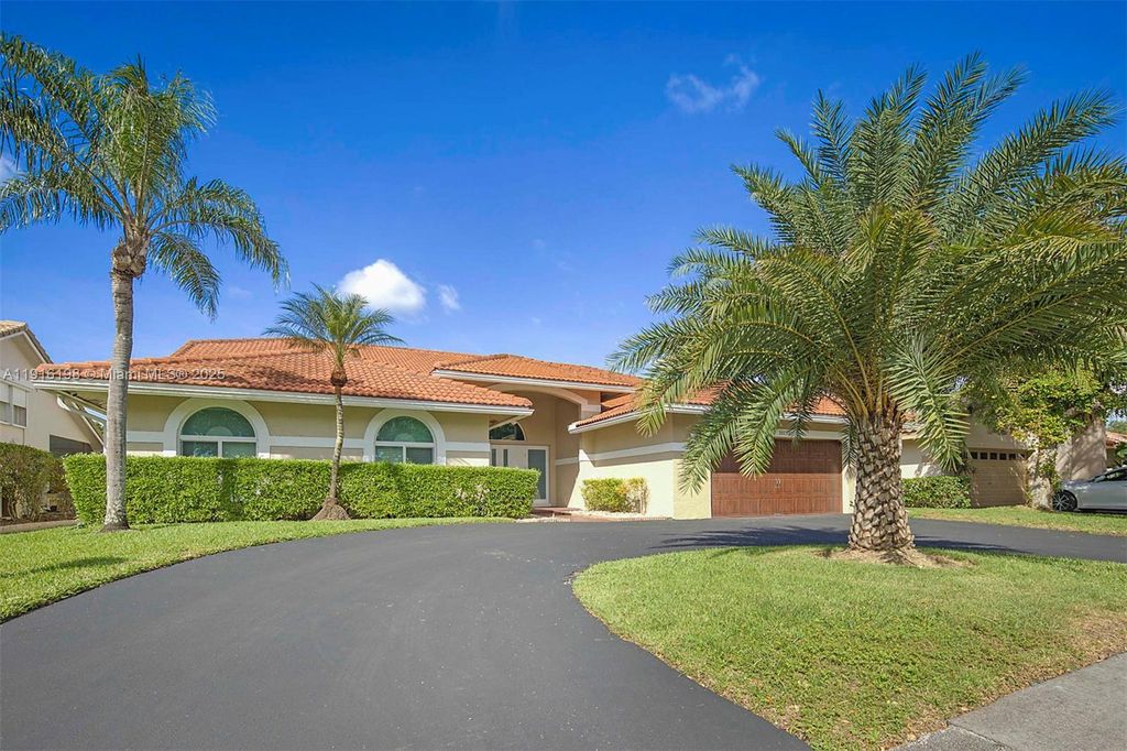 Photo of 10133 NW 48th Dr, Coral Springs, FL 33076 (MLS # A11916198)