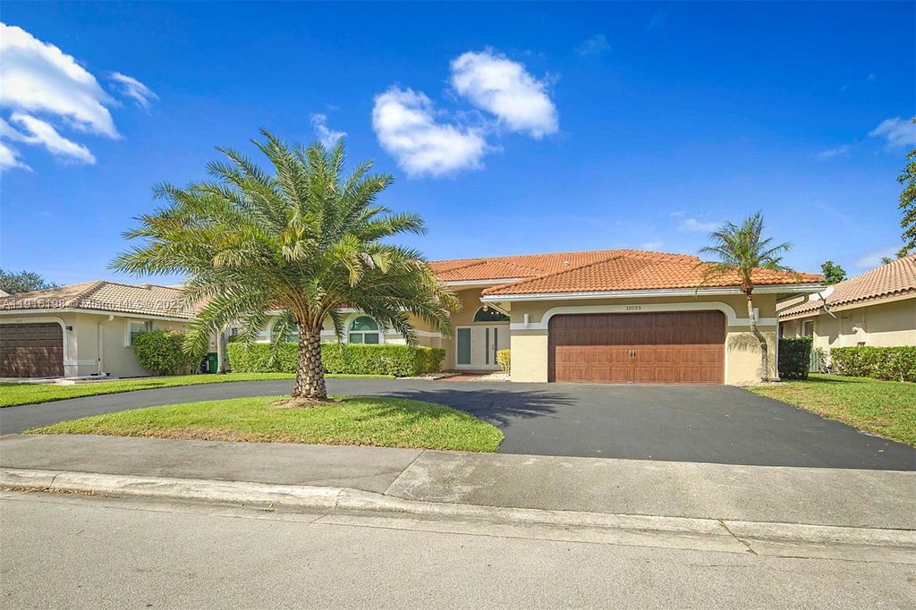 Photo of 10133 NW 48th Dr, Coral Springs, FL 33076 (MLS # A11916198)
