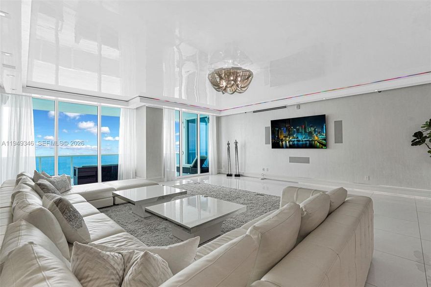 One-of-a-kind residence on the 37th floor, offering breathtaking ocean and Intracoastal views. This expansive 3,395 sq. ft. home features 3 bed, 3.5 bath, den/media room , that can easily be converted into a fourth bedroom, 11 foot ceilings. Private elevator into a formal foyer that sets the tone for the refined elegance found throughout. Meticulously designed and professionally decorated with top-of-the-line finishes, this stunning residence boasts marble floors, custom walk-in closets, and an Italian kitchen equipped with premium Miele appliances. Trump Hollywood, residents enjoy direct beach access and an array of five-star amenities, including a resort-style pool, state-of-the-art fitness and spa center, tennis and basketball courts, wine and cigar lounges, and 24-hour concierge and valet services.