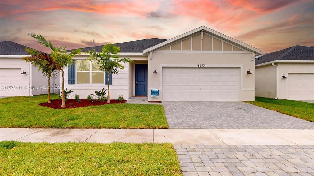 Photo of 8673 Dahlia Cir, Port Saint Lucie, FL 34986 (MLS # A11576411)