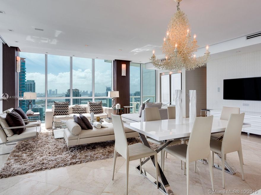 Rarely available spacious floor plan including private foyer entrance and 4 balconies. This 3 bedroom, 3 full bath and half bath unit is professionally decorated and move-in ready. SW corner unit. Ocean and city views, beach, cruise ship alley and downtown. Continuum is located in the most desirable neighborhood, South of Fifth, offering a 1000 linear ocean frontage, 12 acres of luxurious landscape, 2 lagoon shaped pools, exclusive restaurant for residents, 3 clay tennis courts with a Pro-Shop, state-of-the-art gym and spa, concierge, valet and security.