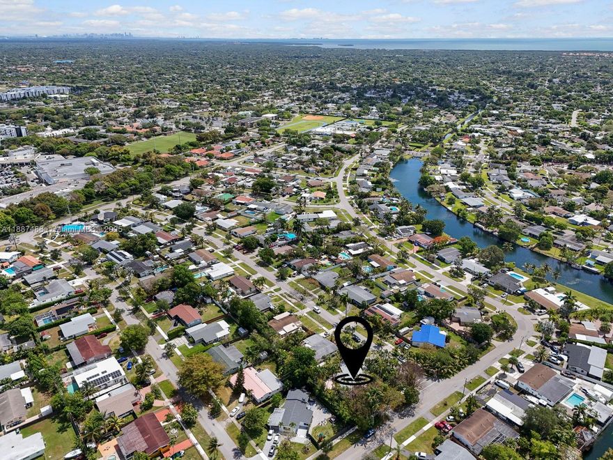 Don't miss this incredible opportunity to own this stunning home at an unbeatable value (built-in equity). Lowest priced per sq ft in Cutler Bay. Beautiful well maintained 4-bedroom 2-bath home featuring a fully exotic landscaped yard, professionally designed by a renowned arborist. Meander through your own private pathways surrounded by easy to maintain lush tropical beauty. Enjoy peace of mind with a 3-year old roof and hurricane accordions throughout. Unwind in the private backyard oasis complete with a gas-powered Jacuzzi. A rare blend of comfort, security, and natural beauty. This home offers charm & beauty that can't be captured in pictures alone. Come walk-through and feel the difference- this one is truly special. Close to shopping, turnpike, and popular Black Point Marina.
